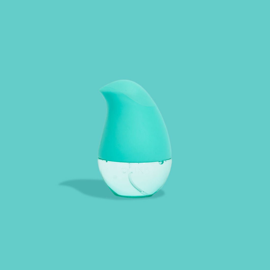 OLIKA Mint Citrus Refillable Hand Sanitizer Spray, Delivered in a Super Ergonomic and Oh So Touchable Design, Shop The Classic Spray Now 